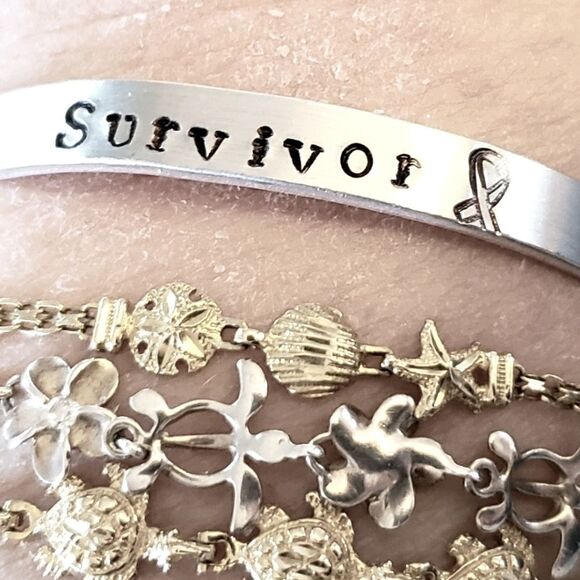 Survivor, Aluminum cuff br… - Picture 1 of 2